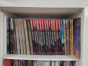 D&D shelf of our TTRPG bookshelf